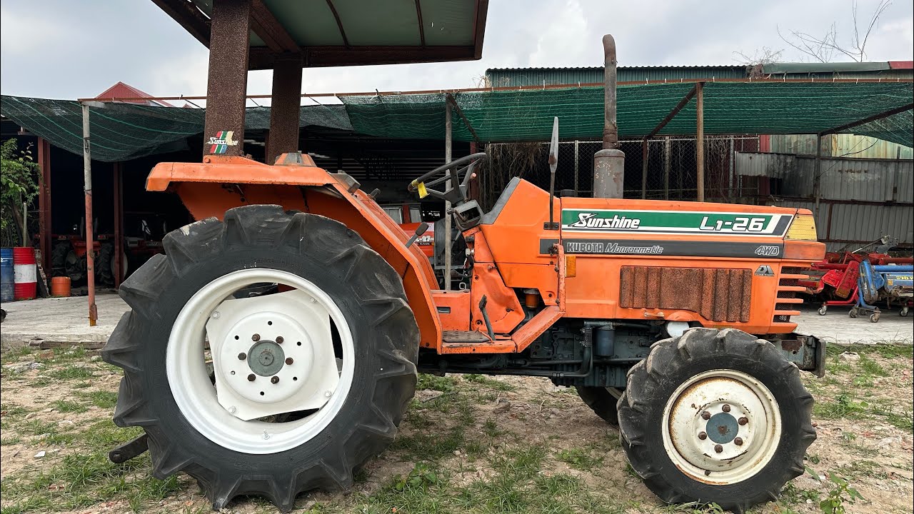 Máy cày bãi.Kubota L1 26 hai cầu,trợ lái,ben cơ,số cơ,chỉnh ngiêng
