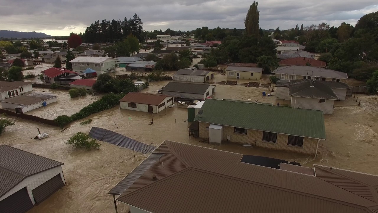 Entire town flooded after stopbank bursts aerial shots