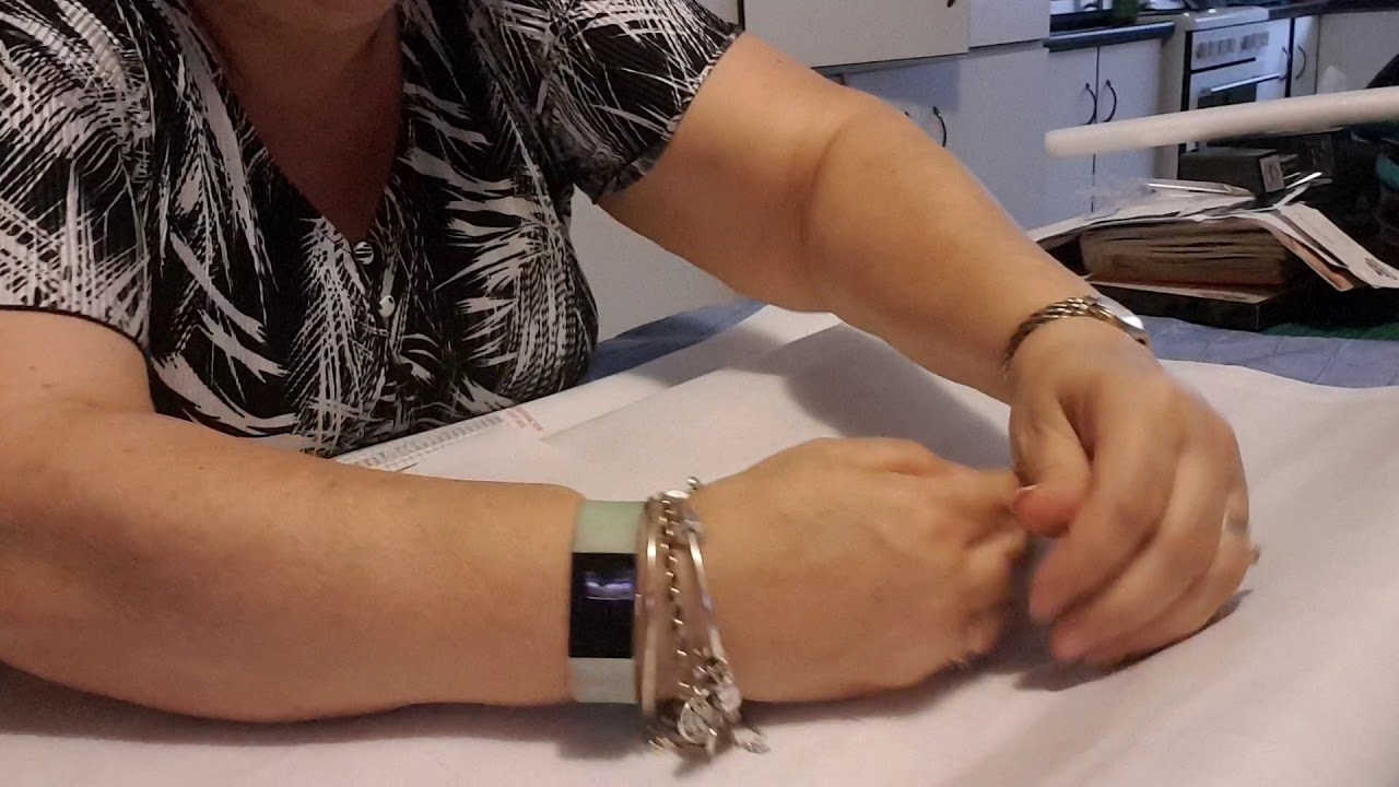 How to flatten a rolled Canvas