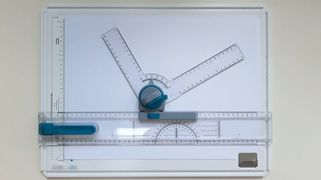 Using the Drawing Board, sliding ruler and drafting head.