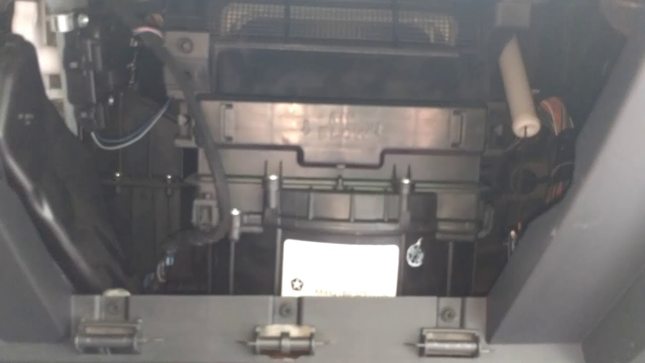 Repetitive clicking noise from cabin fan assembly behind glovebox on Jeep Patriot