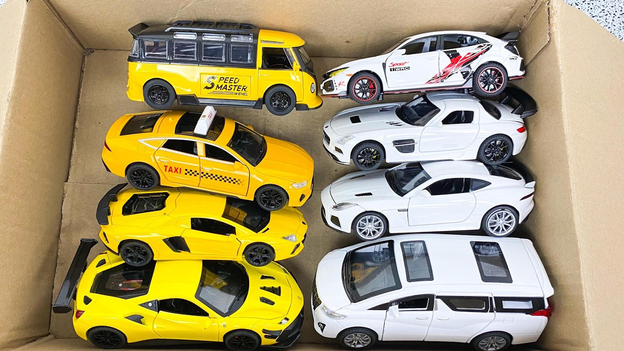 Box Full of Model Cars -Tesla Robotaxi, Tesla Cybertruck, Tesla Roadster, Lexus LC500, Lexus Lm 300h