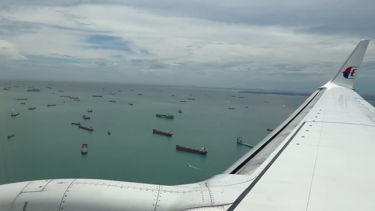 Crossing the Strait of Singapore on final approach Changi **WINDOW VIEW**