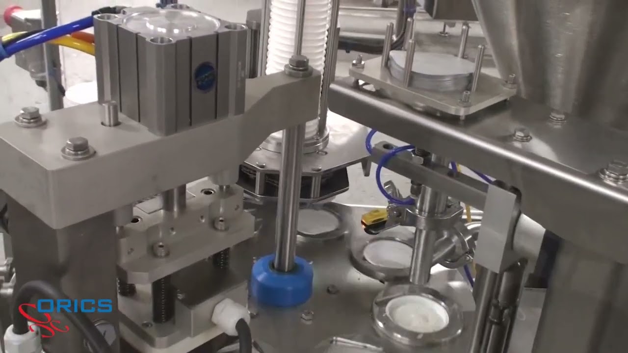 ORICS Industries | MR-35 Rotary Filler for Salad Dressing