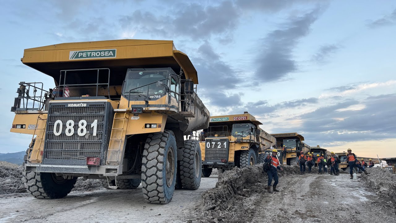 Big Truck Coal mining Activity Loaded on liebherr 9350 Excavator