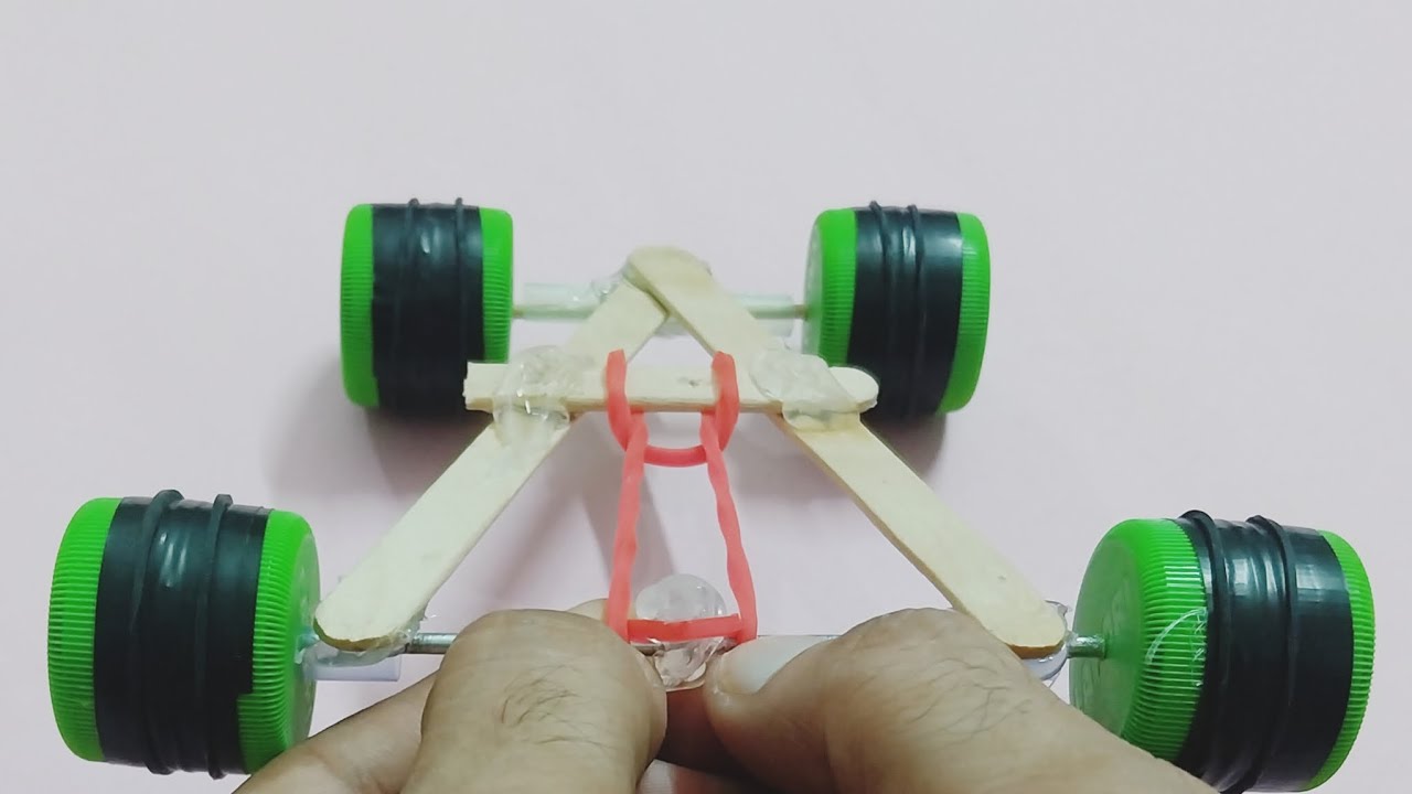 🚀🔥DiY Rubber Band Car  | DIY MINI TOY CAR | SCIENCE PROJECT FOR KIDS | DiY Car From Bottle Caps