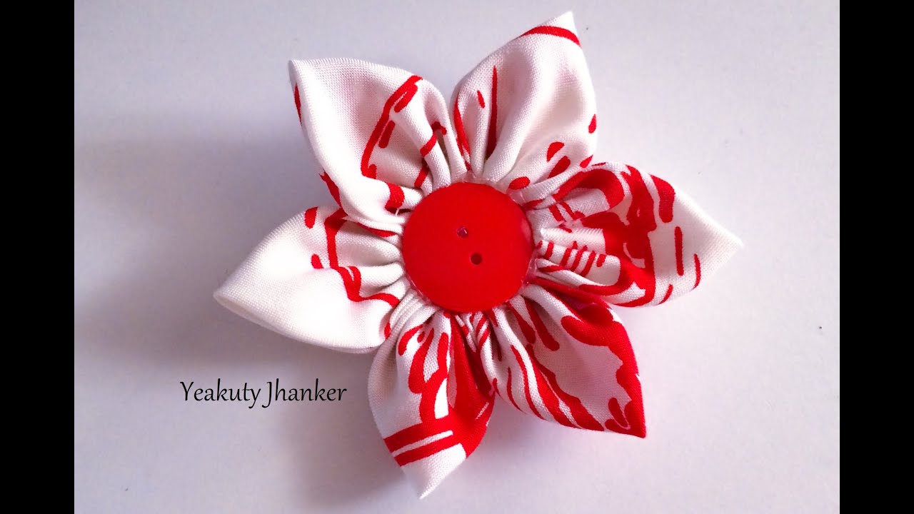 DIY: How to make a Kanzashi fabric flower hair clip.