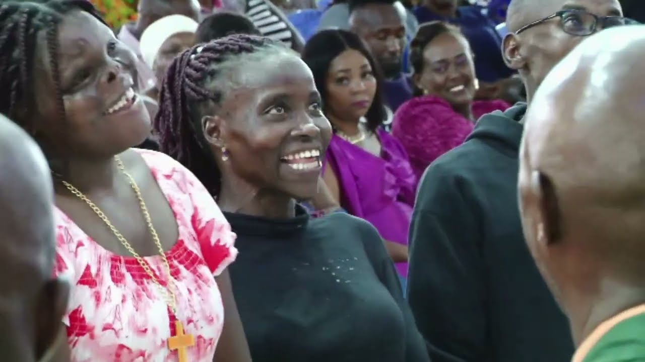 Mother of this able different youth thanks Bishop Ben of JCM for the shop