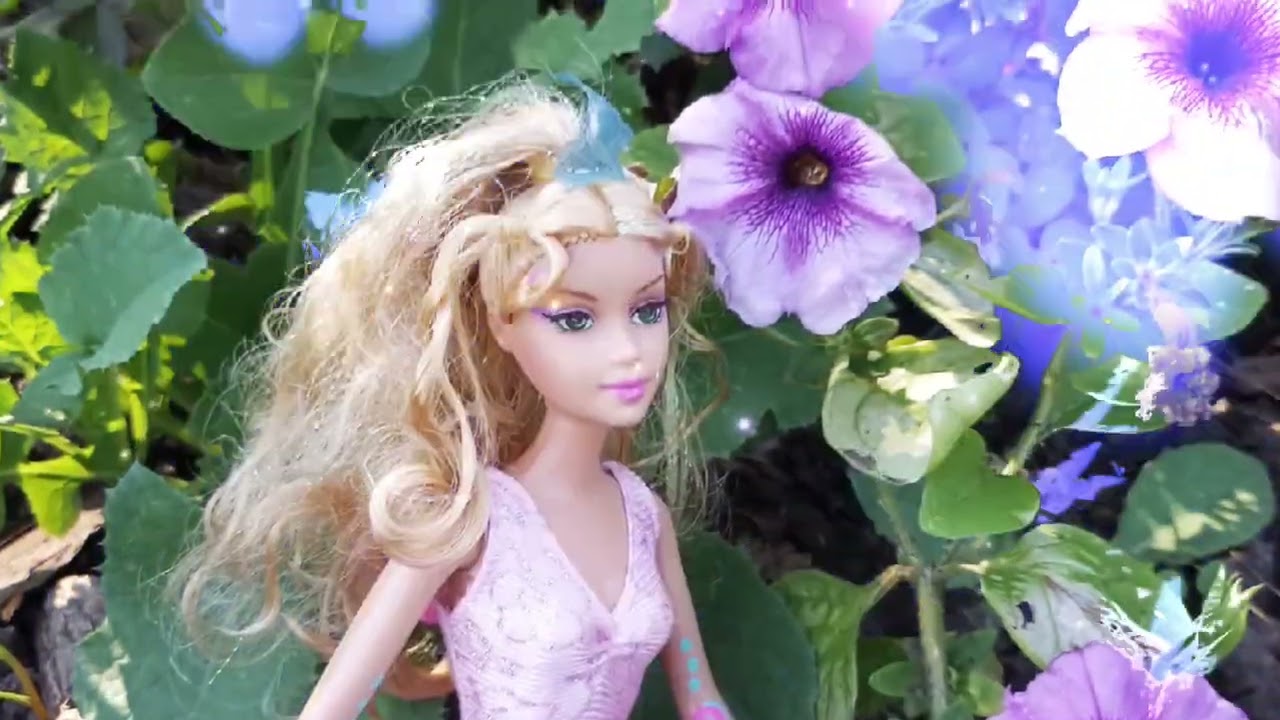 Barbie fairytopia elina doll photoshoot on nature and flowers garden 