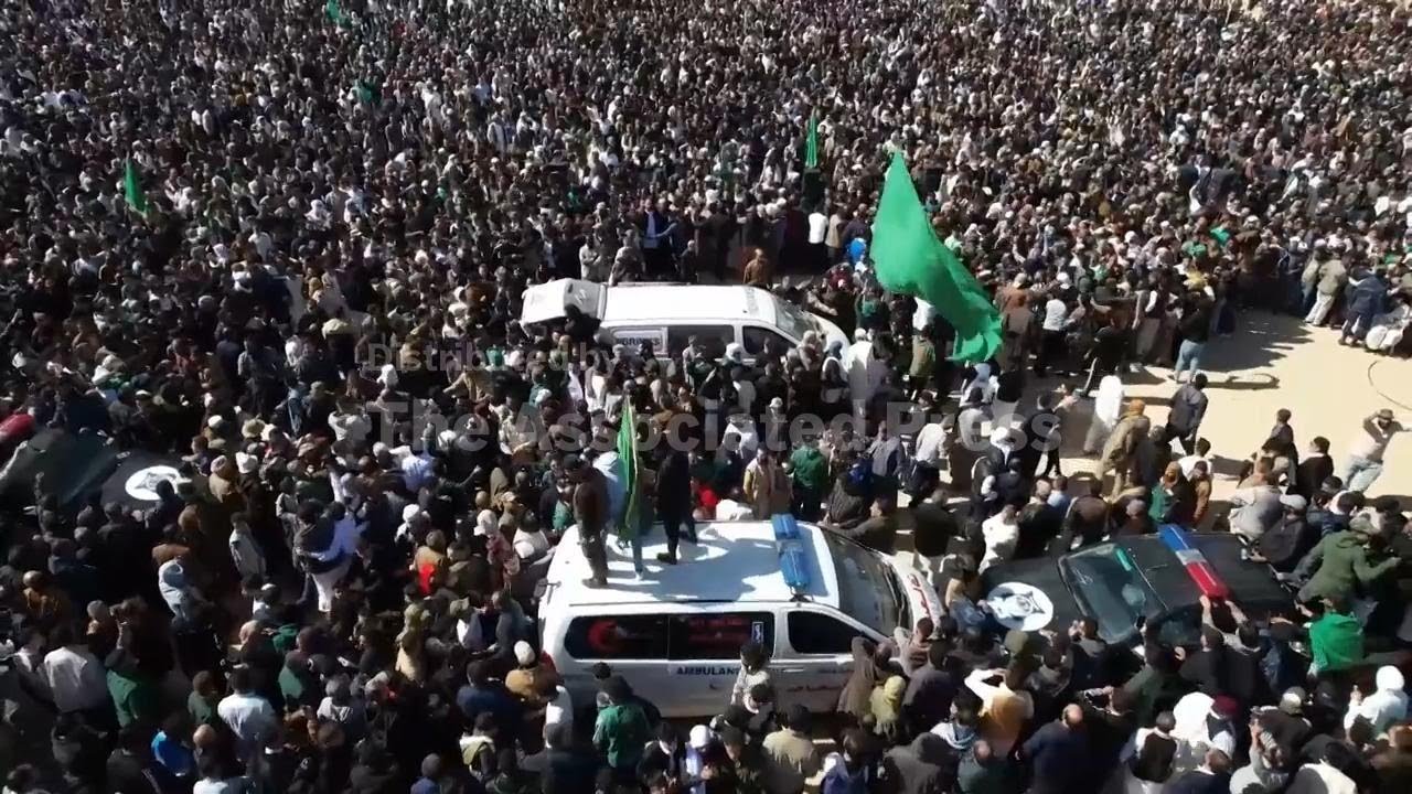 Thousands of Libyans gather for the funeral of Gadhafi’s son who was shot and killed this week