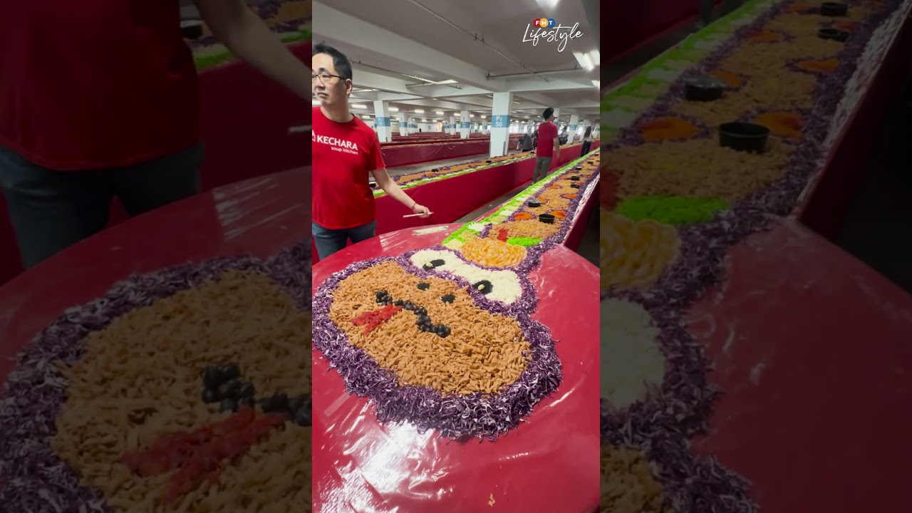 New Record for MBR: 1.2km long snake-shaped Yee Sang