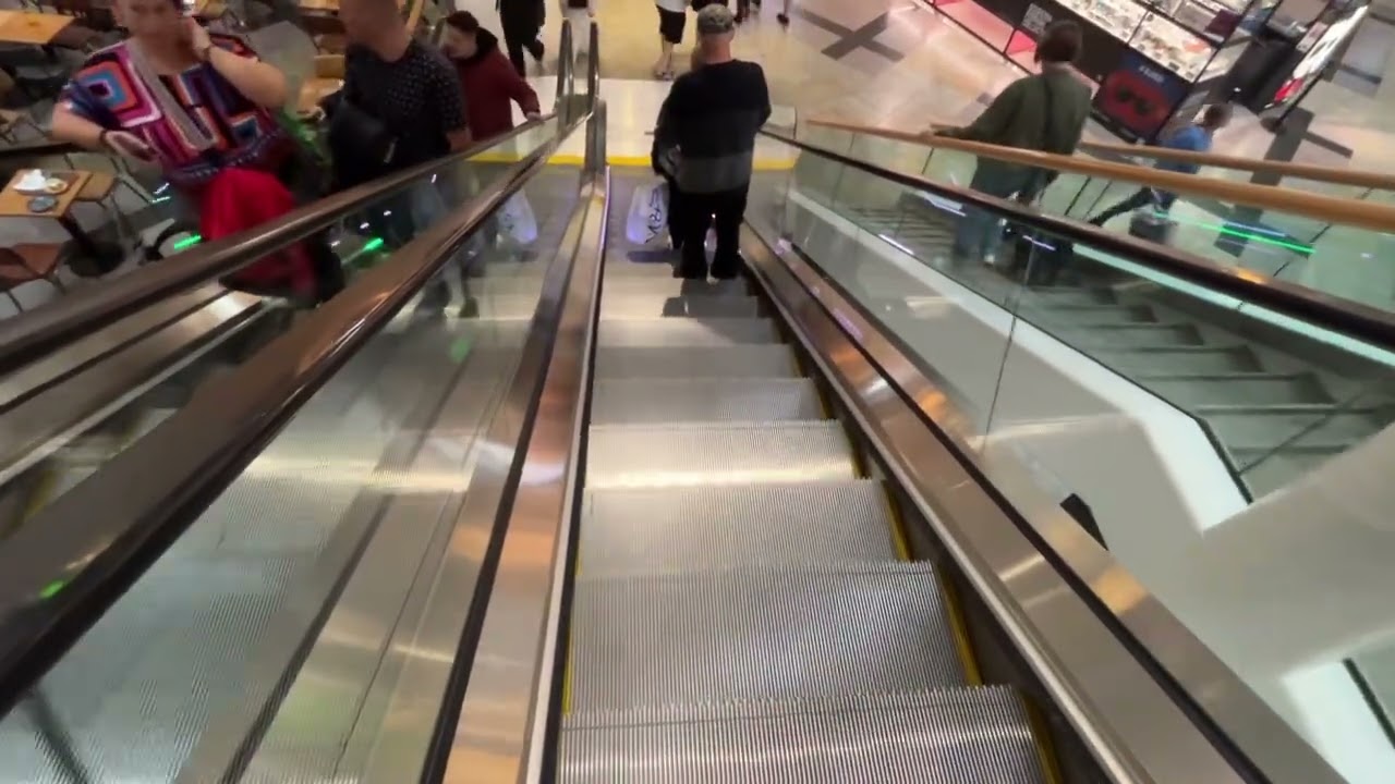 A ride of the new vs old escalators at WestQuay shopping centre [read description]