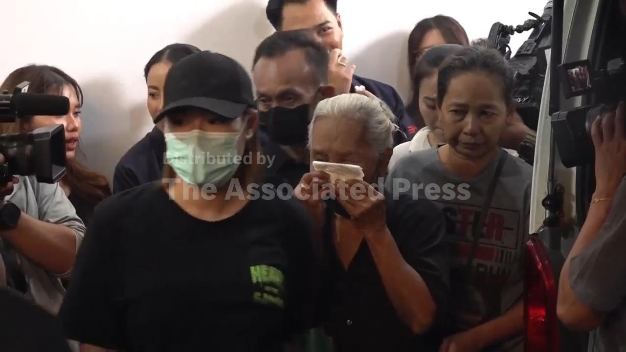 Grieving relatives and friends of Bangkok fire victims express sorrow and anger
