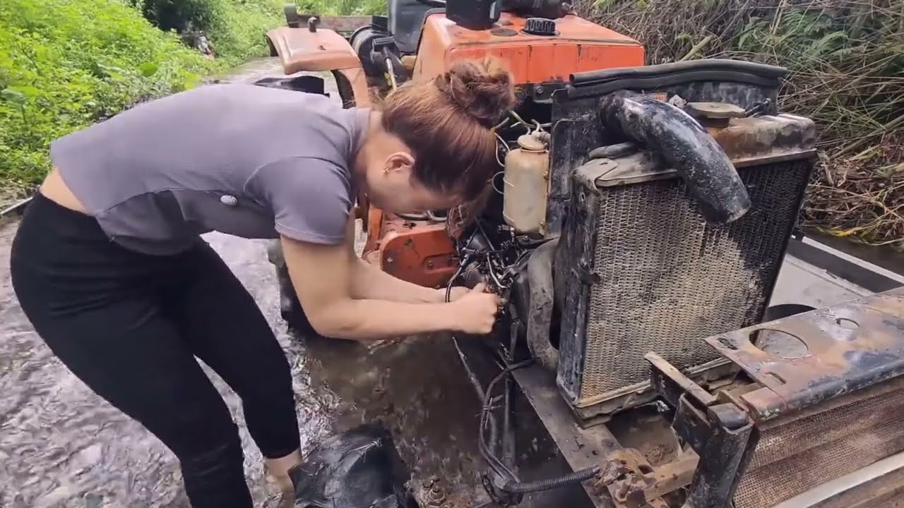 The Girl Restores Flood-Damaged Tractor for a Farmer