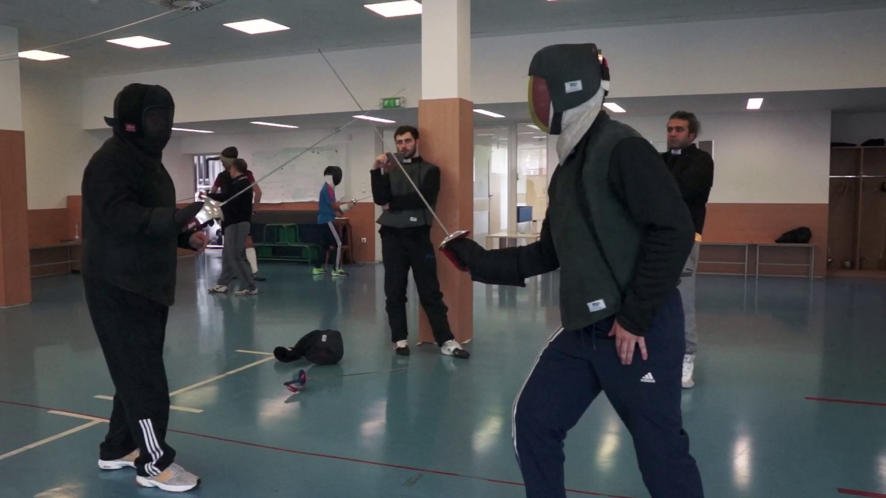 Sabre quinte parry with riposte and counter riposte