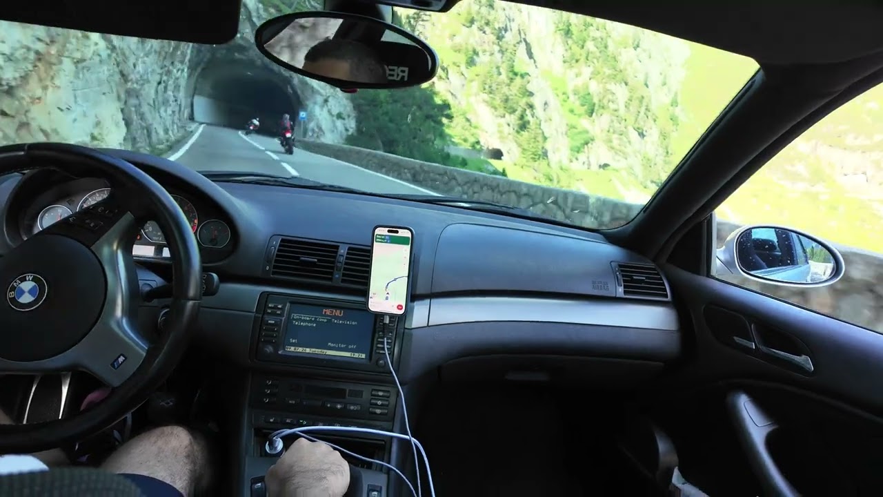 Swiss Alps Susten Pass - Climbing the pass in my E46 M3 racing with the motorcycles