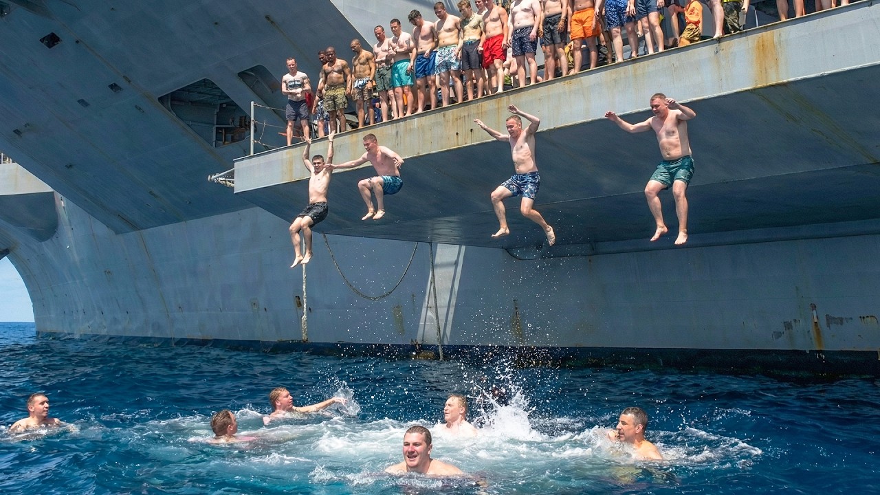 The SHOCKING Reason Navy Sailors No Longer Jump Off Aircraft Carrier Decks