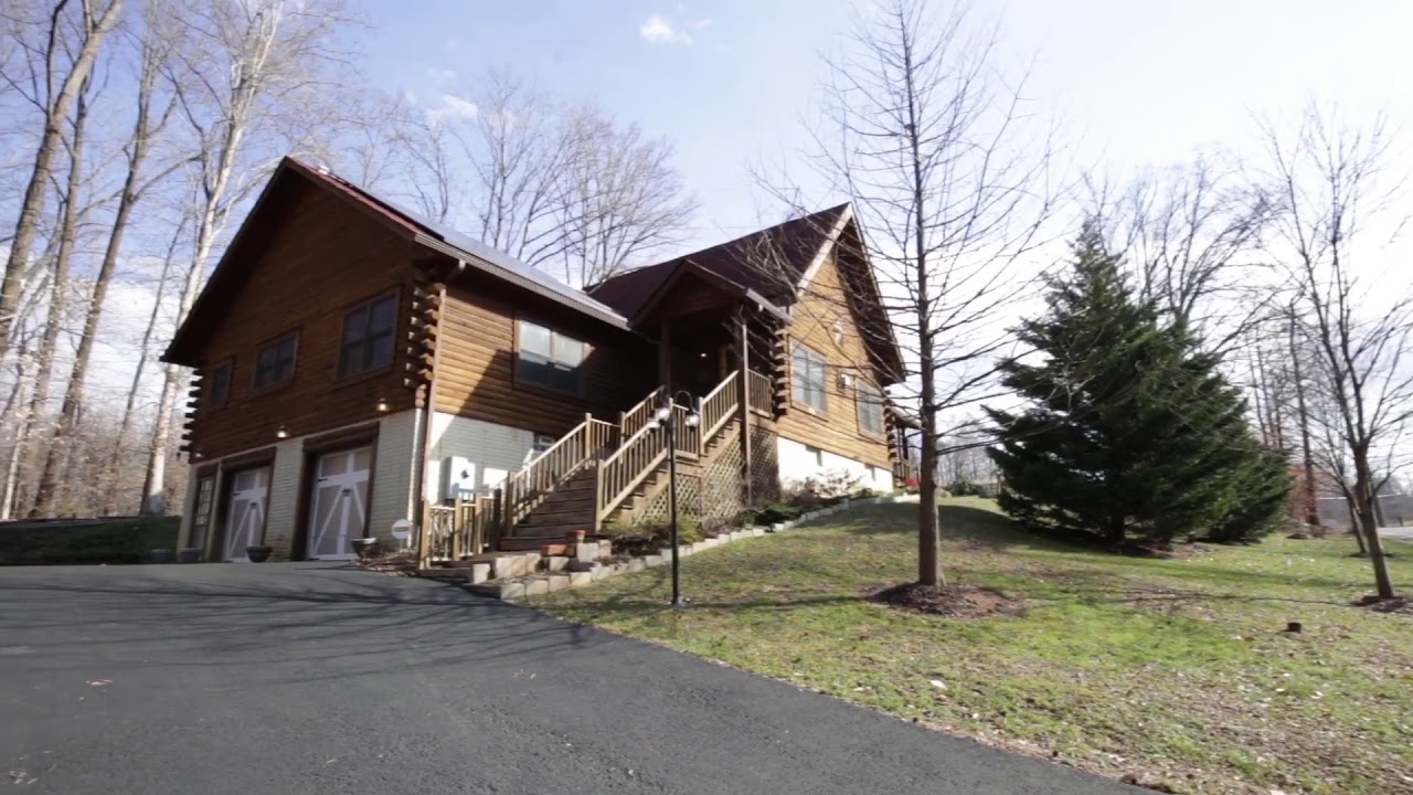 Geothermal Log Cabin Home