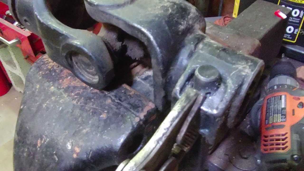 Farmers how to modify the latch pin on a drive shaft to make easy to install on a tractor.