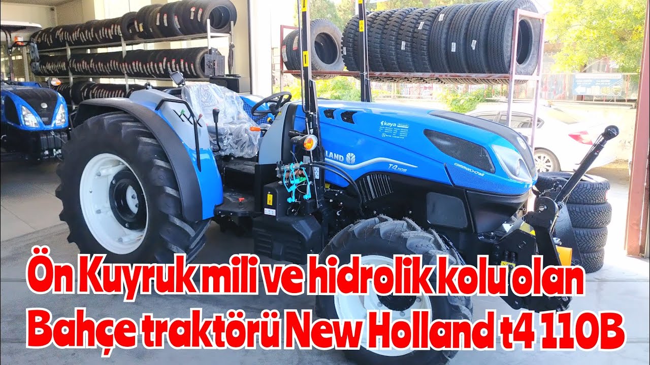 Önünde kuyruk mili ve hidrolik kol bulunan bahçe  traktörü  New Holland t4 110B