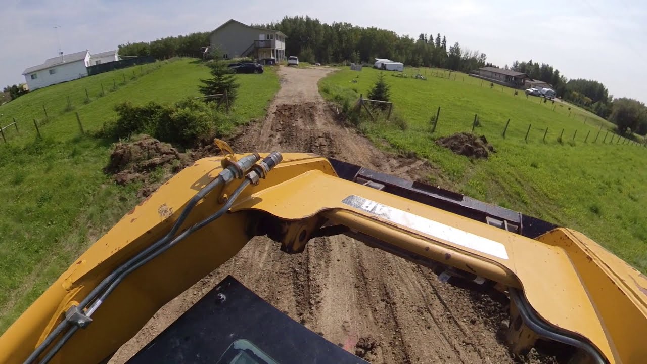 Caterpillar 252B - Drying Subgrade