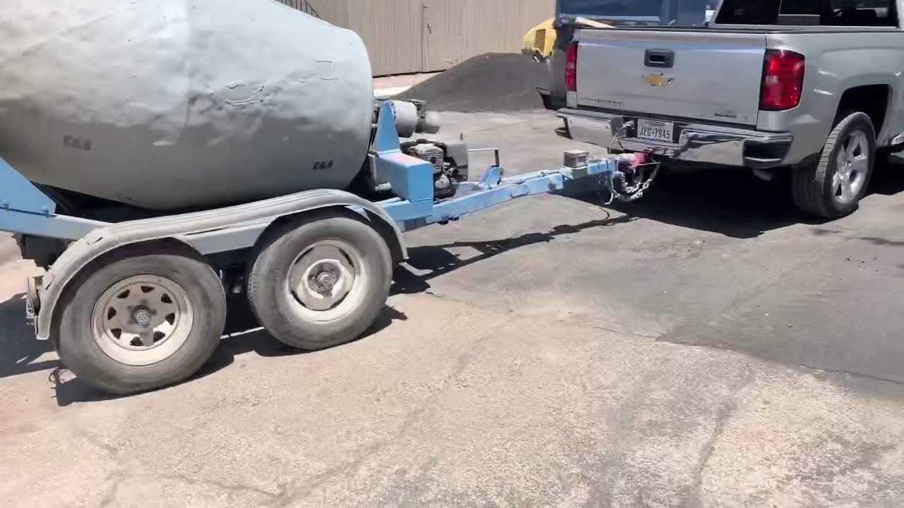 Pull-behind Concrete Mixer in the house!!  1 cubic yard short pour.