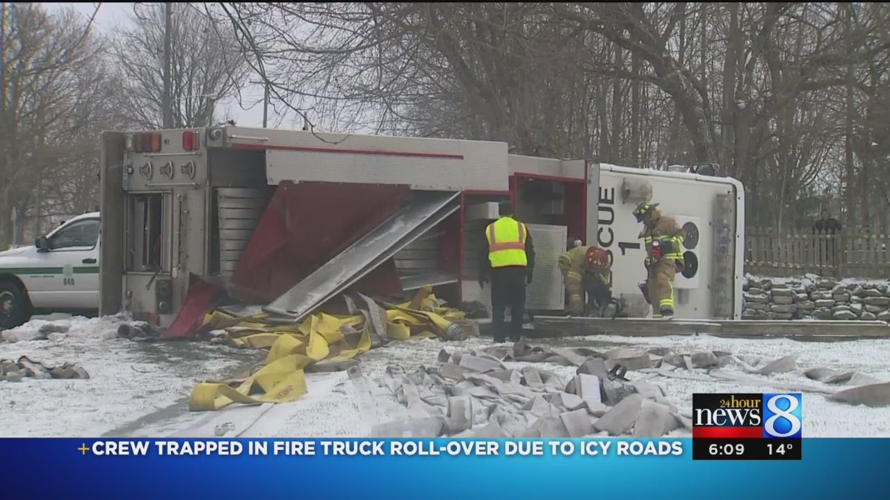 Fire truck rolls over on icy road in Battle Creek
