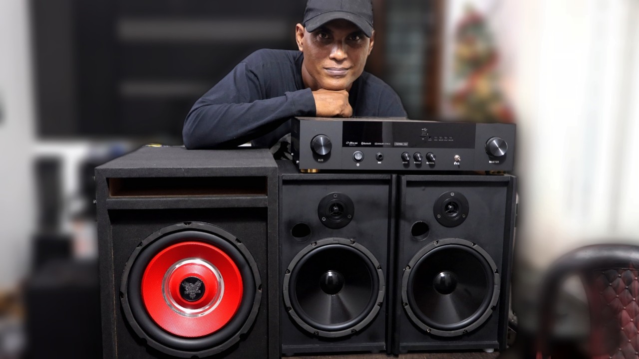 2.1 - 100+100+100 Watts Audio System With Speakers Making