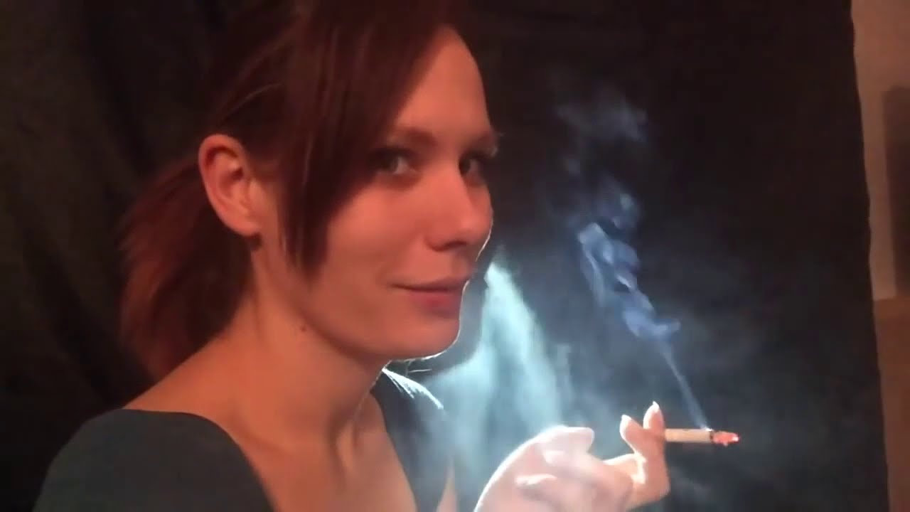 Woman smokes very heavily