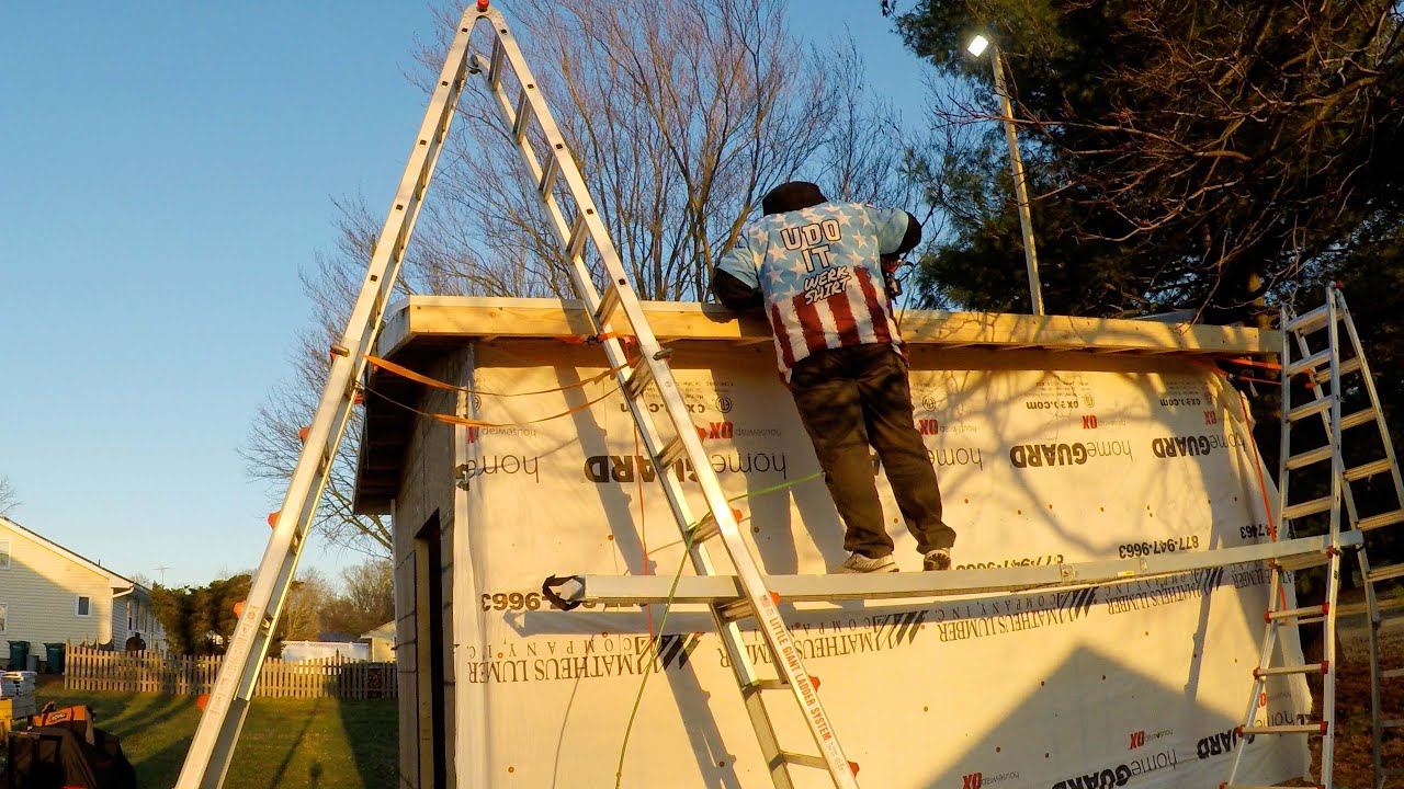 Using a telescoping plank and trestles for working on my shed roof