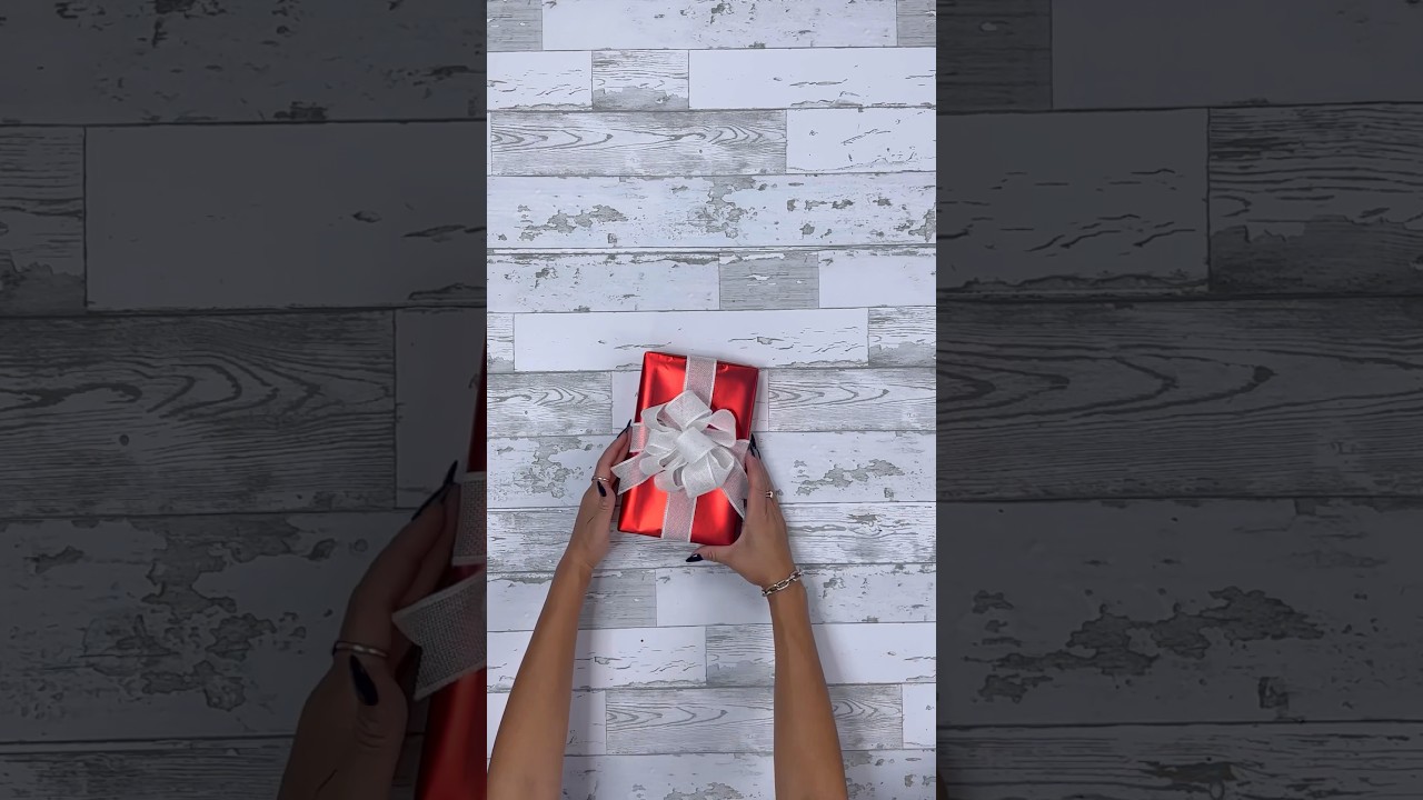 How to make a big ribbon bow! #wrappinggifts #giftwrapping #ribbon