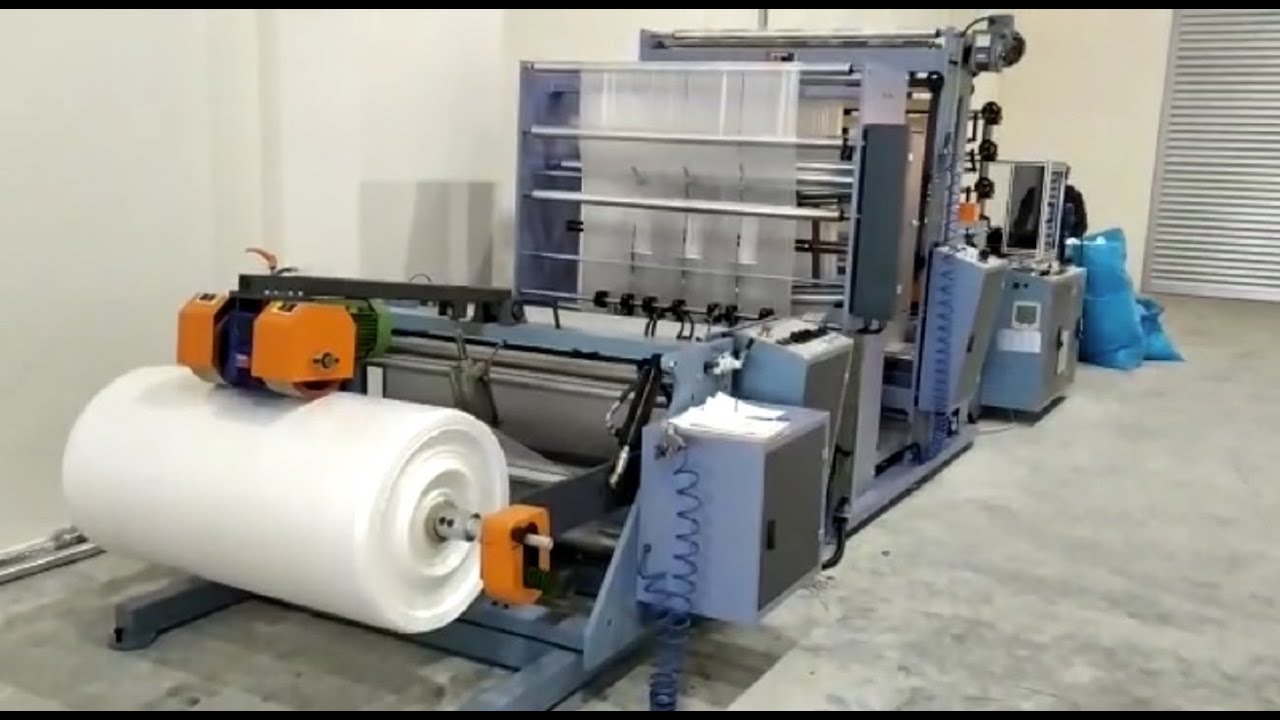 ÖZM 1100 BLS-K SICAK DİLİMLEMELİ KÖRÜKLÜ DİP KAYNAK TORBA MAKİNASI -  BOTTOM SEAL BAG MAKING MACHINE