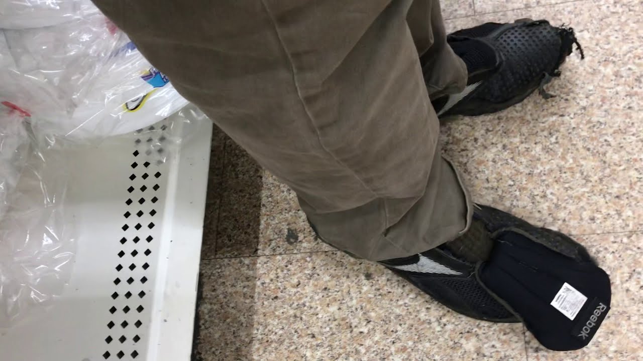 Shopping Wearing Super Trashed Reebok Running Shoes
