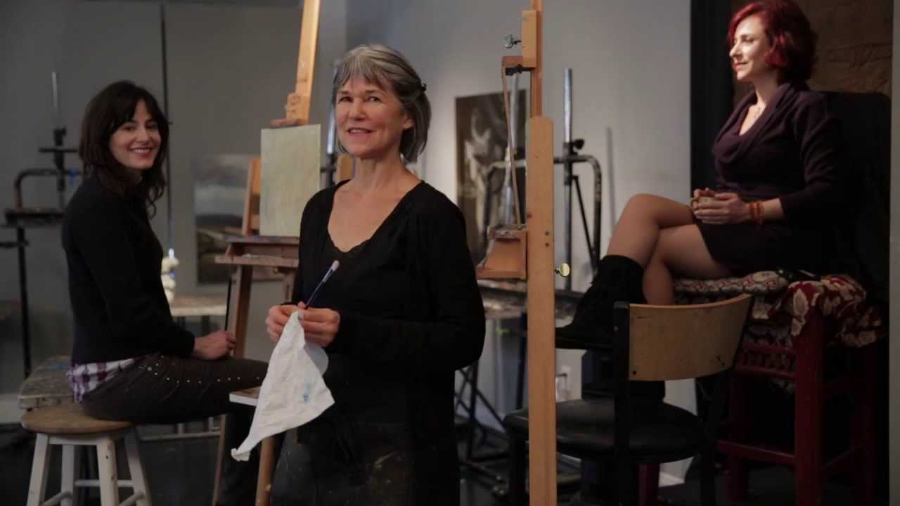 Sherrie McGraw paints a portrait at the Kline Academy