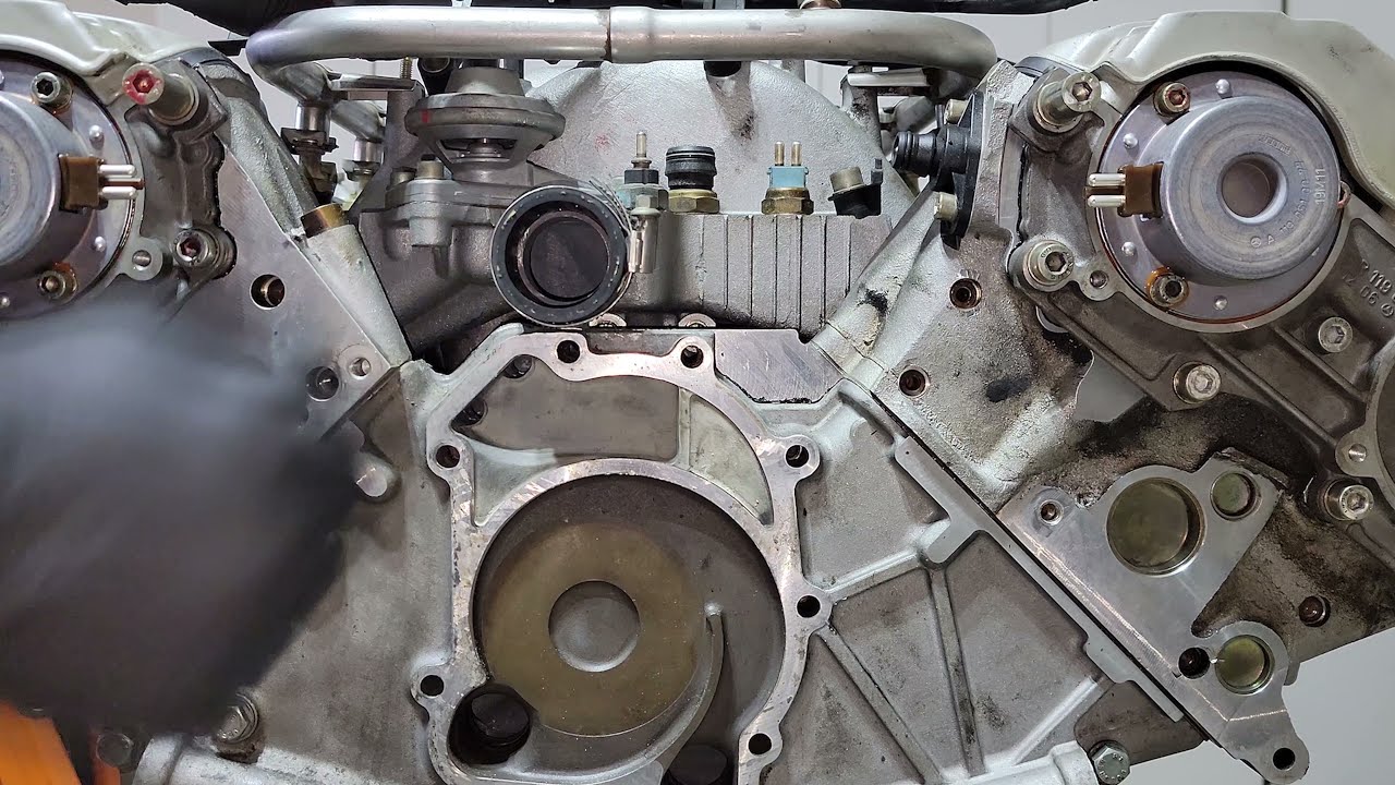 M119 Installing the Water Pump and Exhaust Manifolds