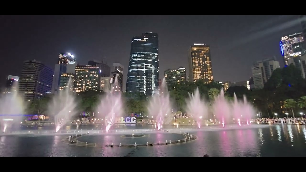 KLCC fountain,  Selena Gomez, baby calm down, calm down, Petronas towers,  Kuala Lumpur,  Malaysia