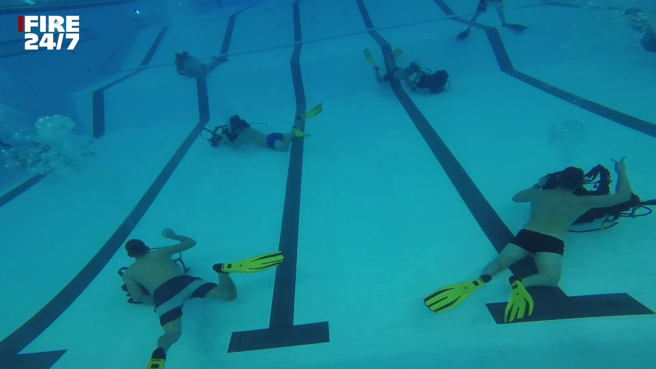 DUTCH FIREFIGHTERS - SWIMMING POOL TRAINING FOR DIVERS FROM THE FIRE DEPARTMENT.