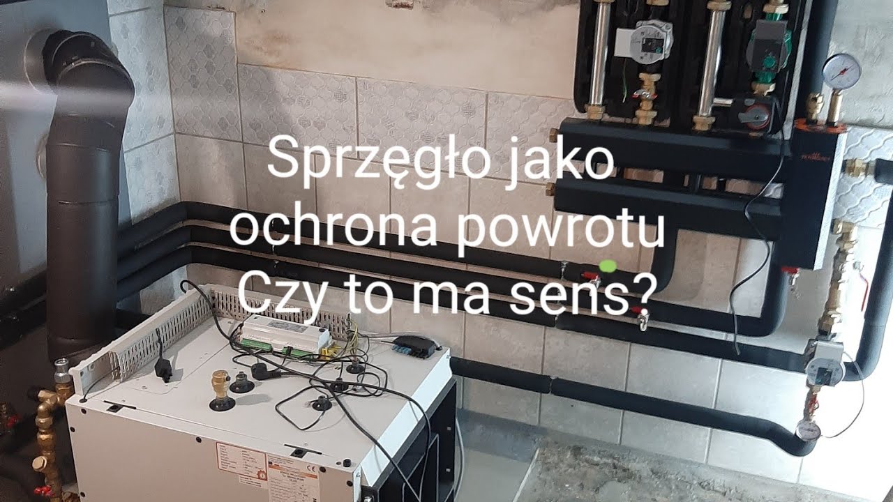 Kotłownia na pellet w piwnicy. KOTŁOSPAW  Slimkoplus 12kw + sprzęgło i grupy pompowe TERMOJET.