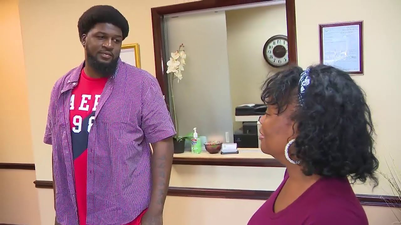 Security guard hailed a hero for helping rescue disabled woman from hot van