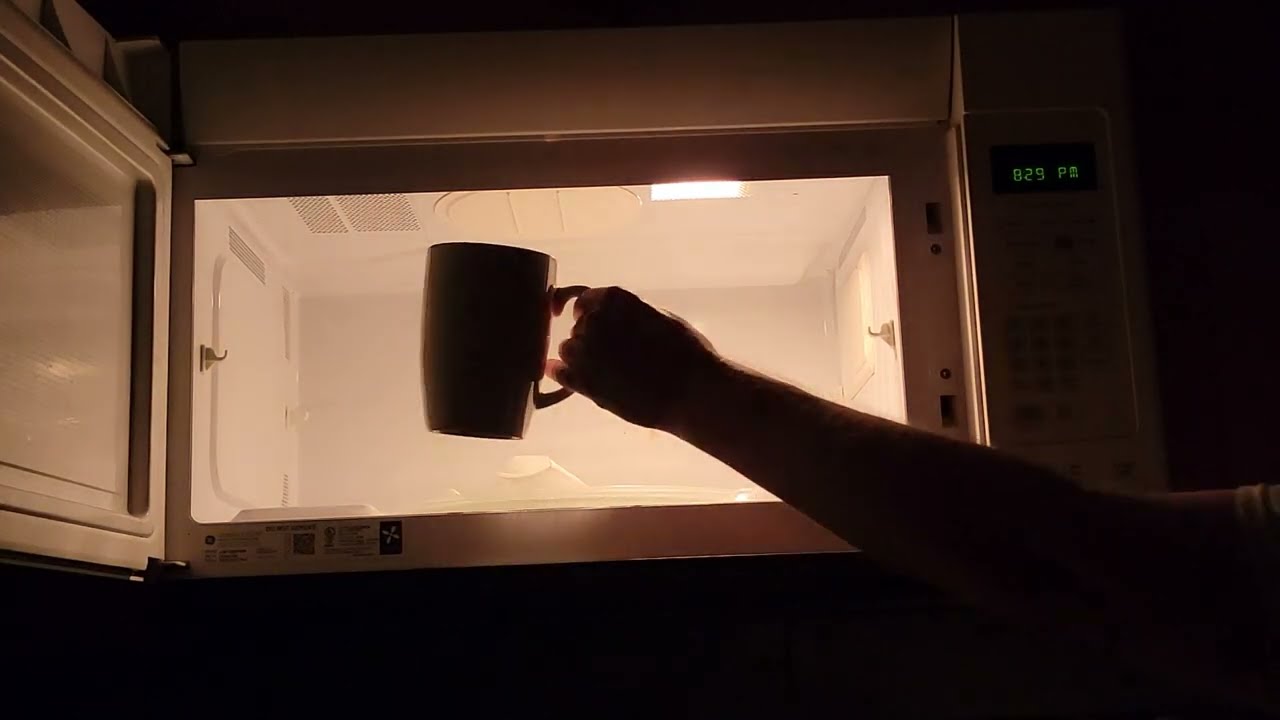 Ambient Microwave hot water, night time  Strobe lighted  (Warning contains flashing lights)