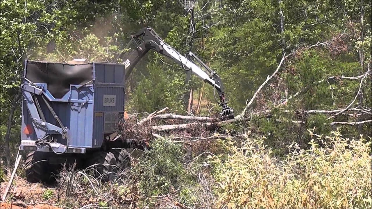 Bruks 805.2 on Timberpro 830B chipping hardwood in Texas USA