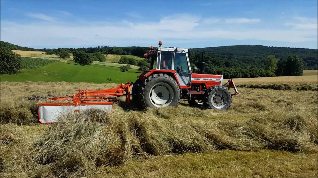 Heuernte 2016 Schwaden mit Massey Ferguson 1014 und Kuhn GA 4321