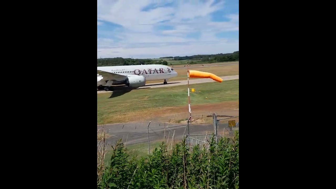 Close up taxi of Qatar Airways Boeing 787-8 (A7-BCX) at Edinburgh Airport.