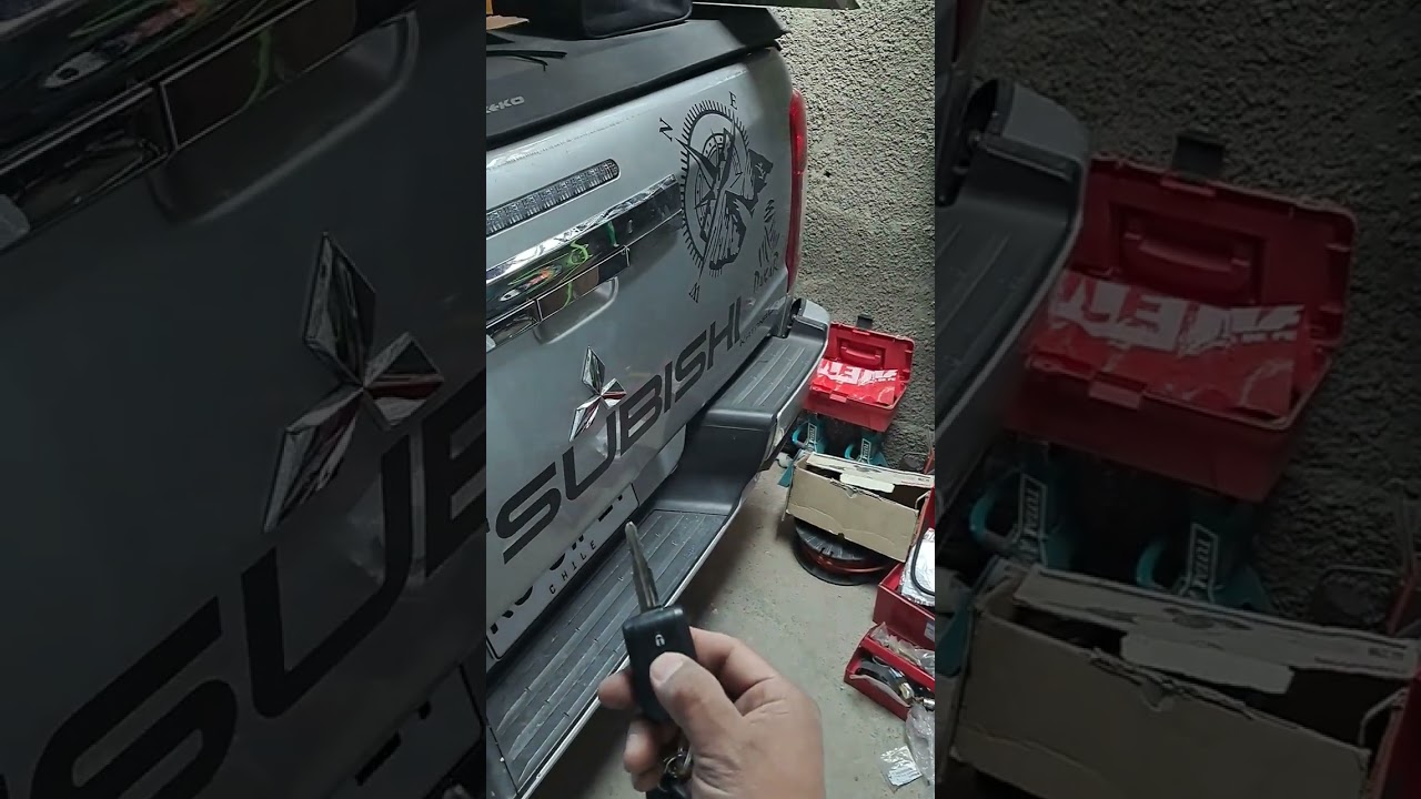 instalacion cerradura portalon L200 crt mitsubishi 2022