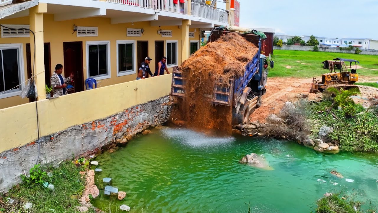 Massive Flooded Landfill Transformed! Bulldozer Pushes Stone & 5 Ton Trucks Unloading Stone to Pond