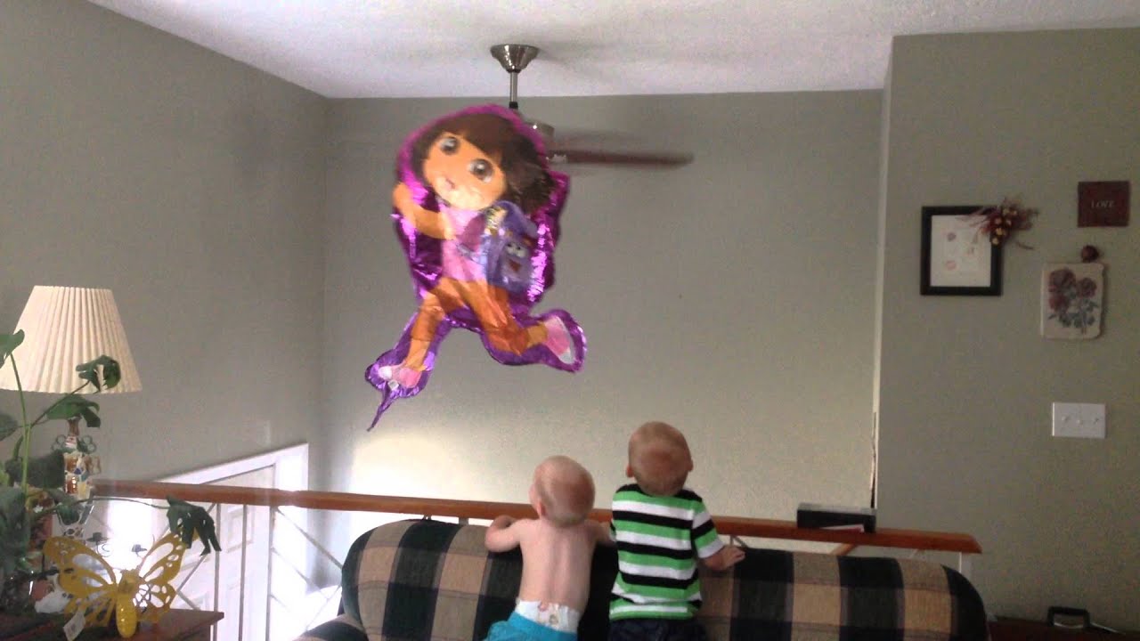 Dora the Explorer balloon caught in the fan! Boys laughing hysterically!
