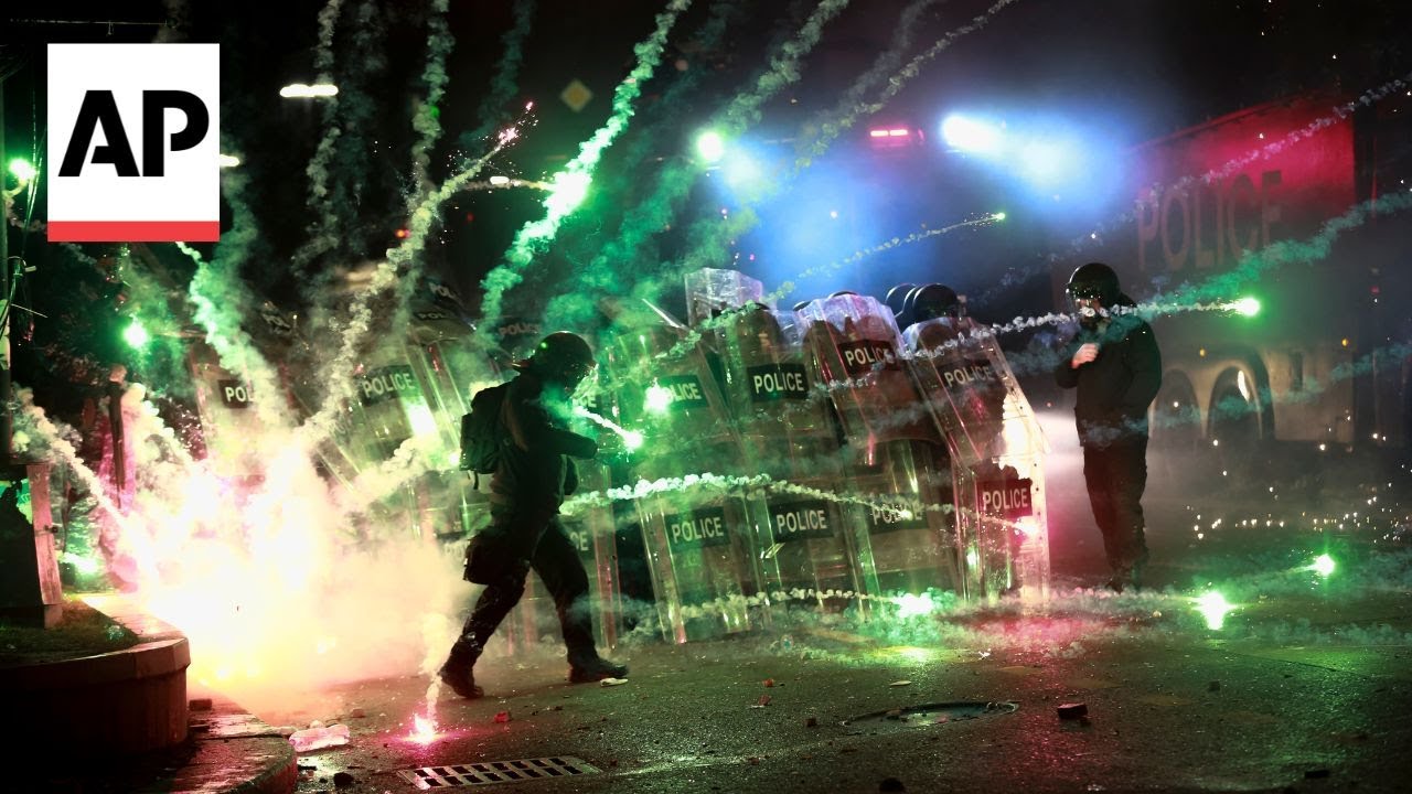 Georgian protesters clash with police for a second night after EU talks are suspended