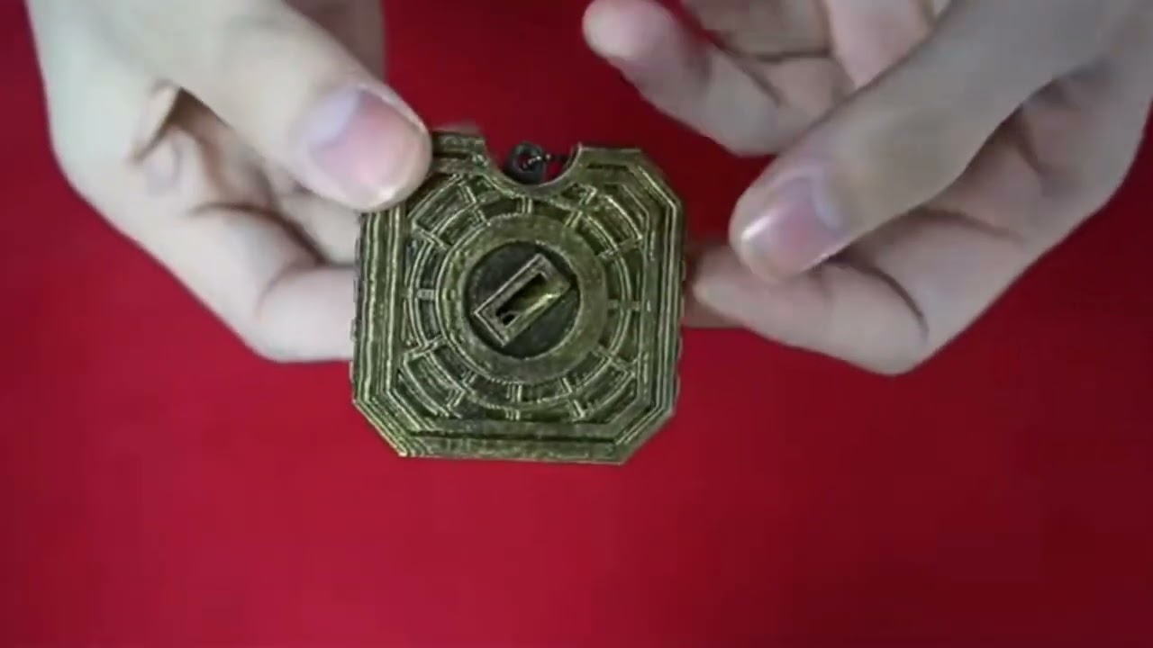 Deluxe Key Thru Coin - Sword Magic