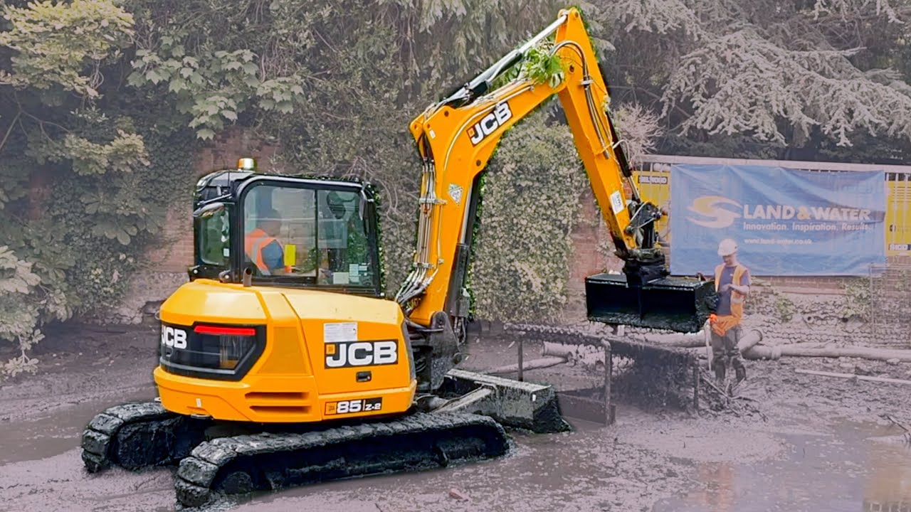 JCB removing silt from an 80 year old pond