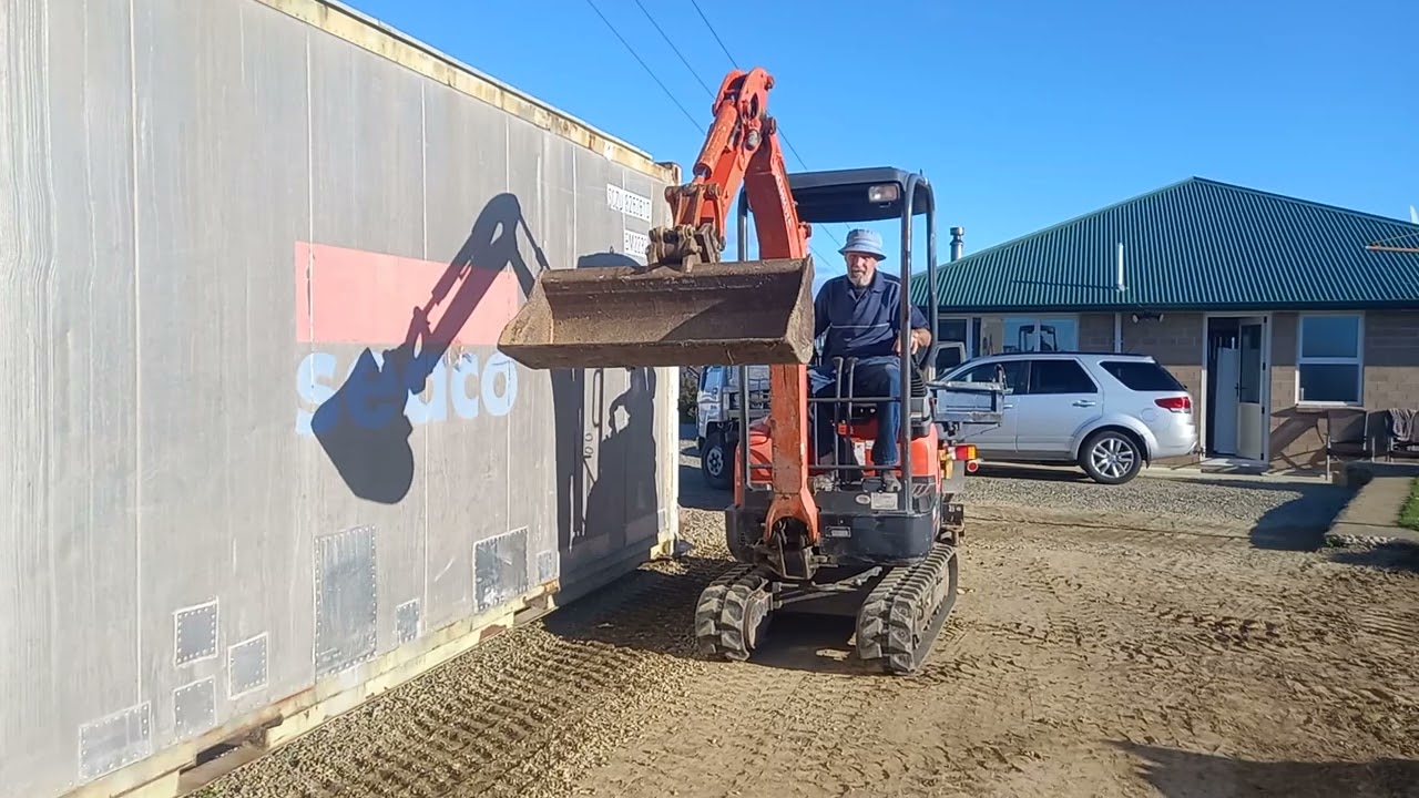 Ang workaholic man driving excavator now.